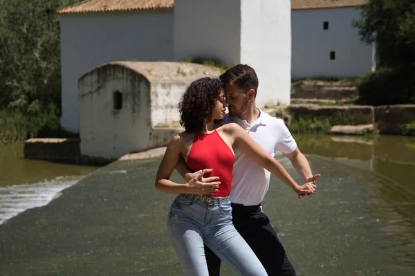 Attractive Young Couple Dancing Sensual Bachata Stone Floor Outdoor Park — Stockfoto
