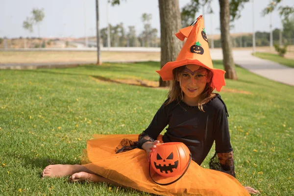 Girl Black Shirt Witch Hat Orange Skirt Pumpkin Skirt Sitting — Foto de Stock