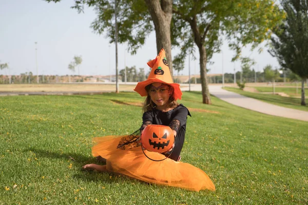 Girl Black Shirt Witch Hat Orange Skirt Offering Pumpkin Receive — Stock Fotó