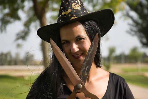 Woman Black Witch Suit Hat Huge Pruning Shears Hands Evil — Fotografia de Stock