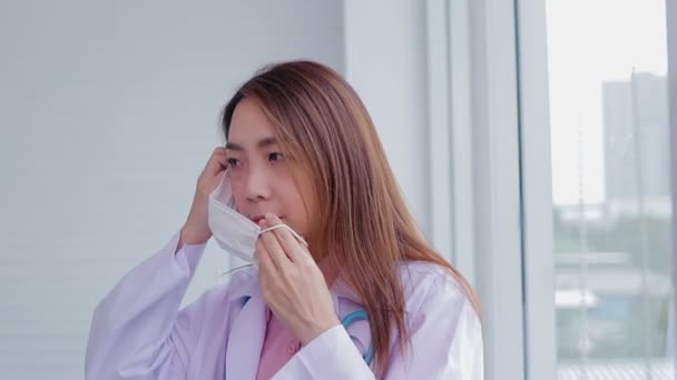 Asian Beautiful Woman Doctor Standing Window Office She Wearing Mask — Stock video