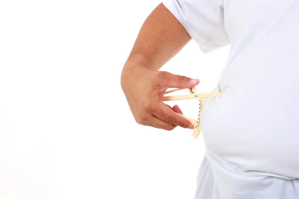 Hombre Gordo Sosteniendo Una Pinza Para Medir Cantidad Grasa Estómago —  Fotos de Stock