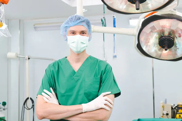 Asian Male Doctor Standing His Arms Crossed Wearing Green Surgical — Foto de Stock