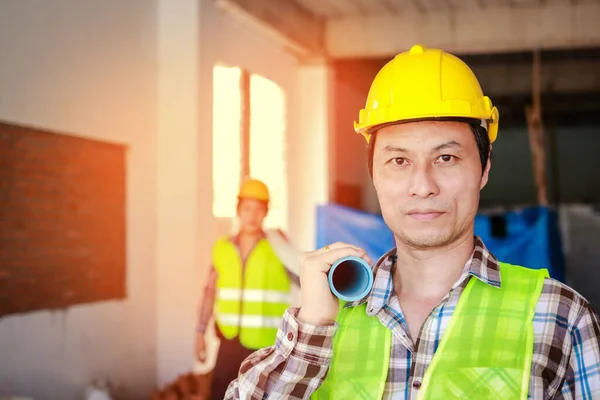 Construction Worker Wearing Yellow Helmet Hold Working Equipment Project Site —  Fotos de Stock