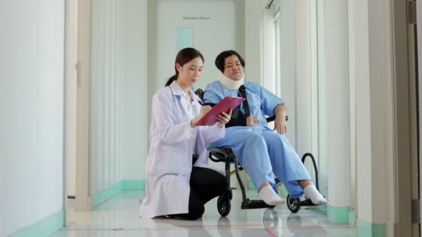 Female Doctor Taking Notes Treatment Obese Female Patients Stiff Neck — 图库视频影像