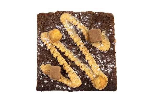 배경에는 맛있는 초콜릿 케이크 브라우니가 분리되어 — 스톡 사진