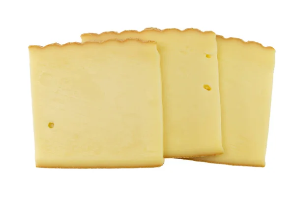 白地に隔離されたチーズラクレットのスライスは — ストック写真