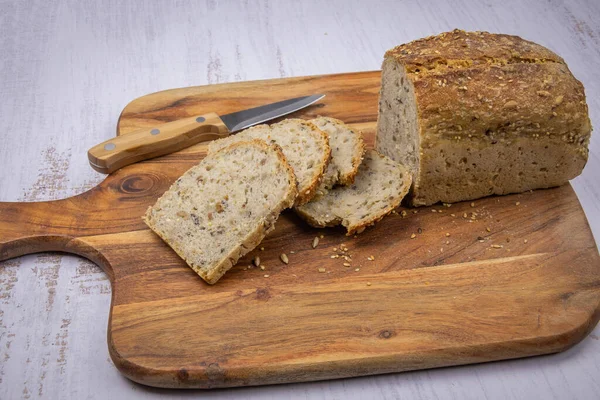 Sliced Homemade Bread Seeds Knife Wooden Board — Stock Photo, Image