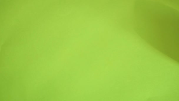 绿色背景的卷筒纸 — 图库视频影像