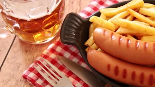 Fast Food French Fries Sausages White Plate Glass Beer Table — Stock Video