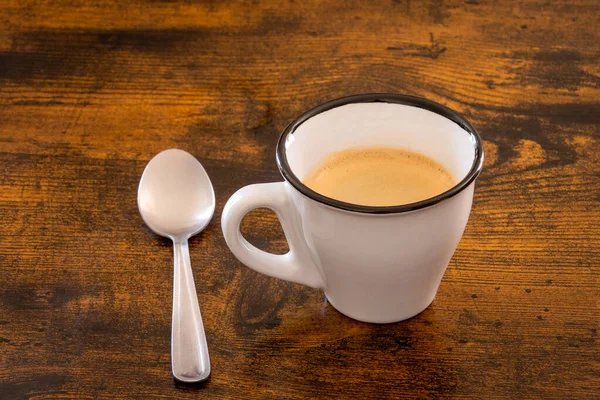 Tasse Kaffee Und Löffel Auf Holztisch — Stockfoto