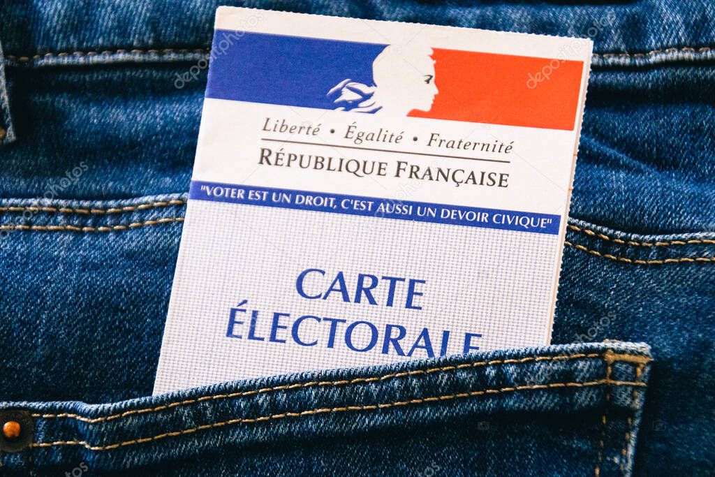 Electoral map of France in the pocket of jeans close up