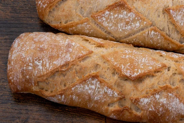 close-up bread sticks on a cutting board