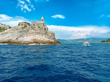 Porto Venere, La Spezia, Italy - The Doria castle of Portovenere and the Church of San Pietro seen from the sea