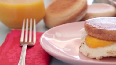 close up of delicious sandwich with fried egg and cheese 