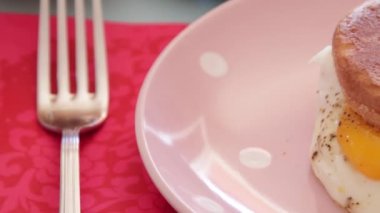 close up of delicious sandwich with fried egg and cheese 