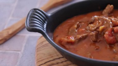 close up beef goulash in a dish