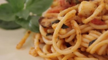 plate of spaghetti with seafood close up