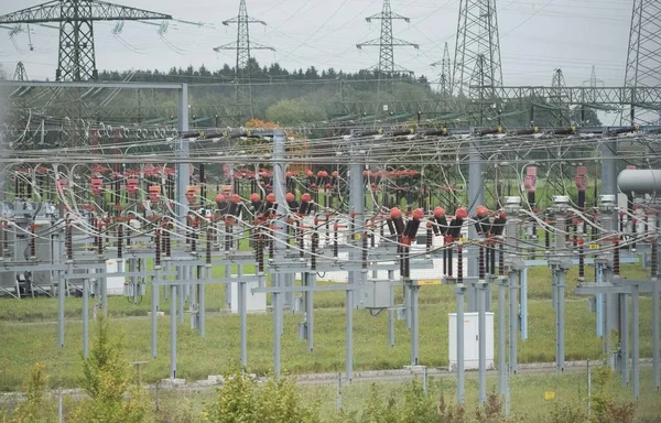 an electrical substation and electricity transformer as part of the power grid
