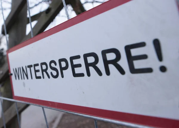 a winter closure road sign, no road traffic in winter season