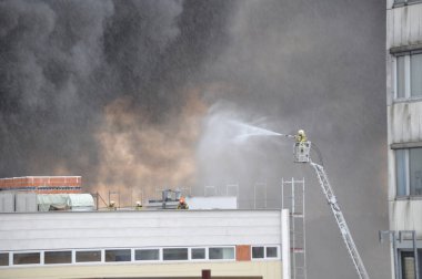 extinguishing water used by fire fighters to put a fire