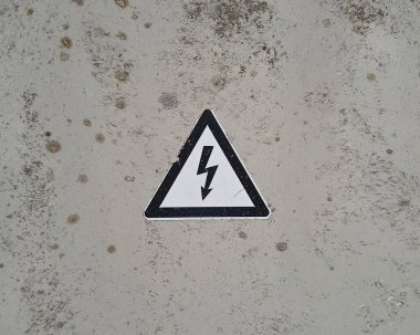 yıldırım, tehlikeli elektrik ve güç için bir uyarı işareti.