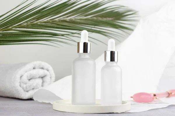 Spa Composition Two White Bottles Essential Oil Serum Podium Massage — Stock Photo, Image