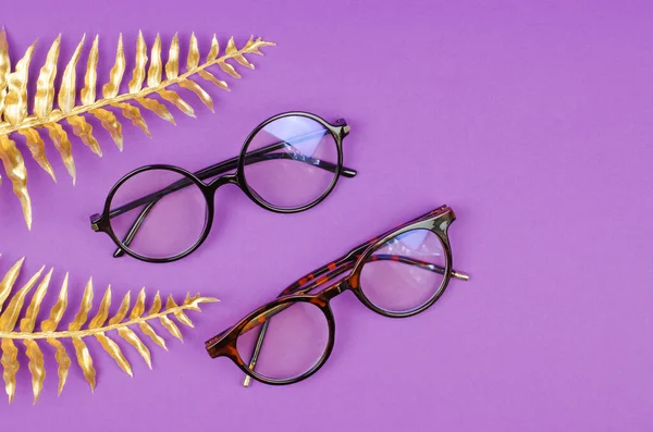 Stylish Women Glasses Purple Background Golden Palm Leaves — Foto Stock
