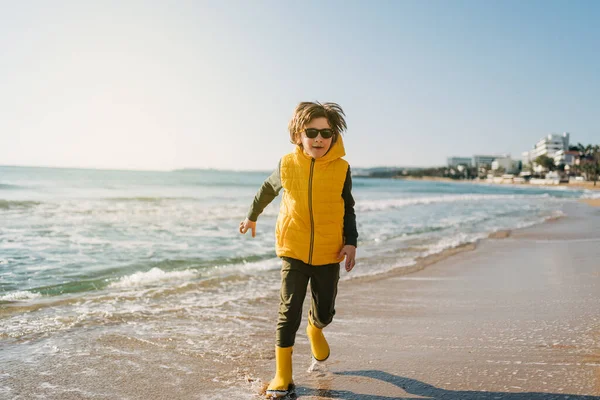Boy Yellow Rubber Boots Playing Sand Beach School Kid Touching — Stockfoto