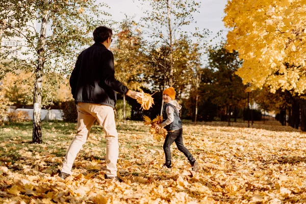 Father Son Having Fun Autumn Park Fallen Leaves Throwing Leaf — Zdjęcie stockowe