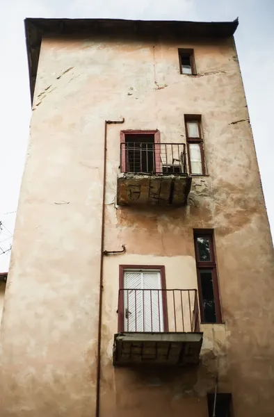 Old building with balconies and windows — Stock Photo, Image