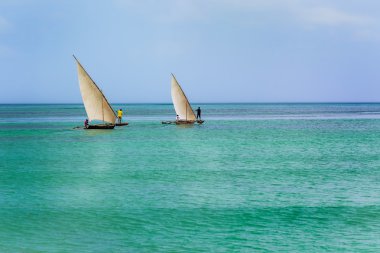 Boat fishermen Zanzibar clipart