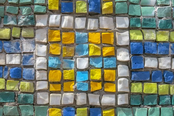 Colorful stone mosaic near the monument in the park