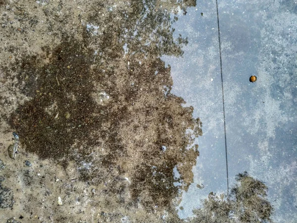 Puddle on the road after heavy rain