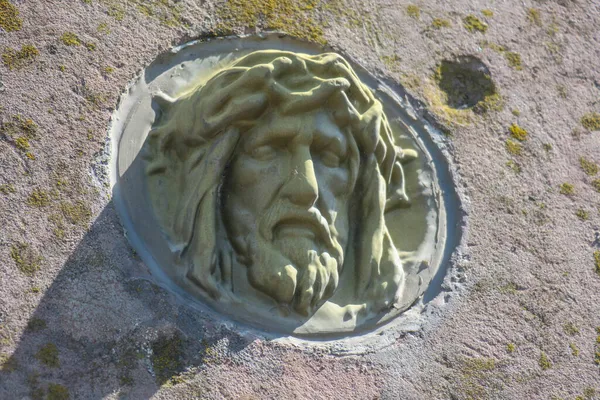 Stone image of Jesus Christ in the cemetery