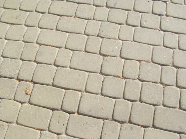 Arka planlar için parktaki beton kaldırım dokusu
