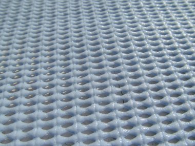 Mavi sentetik halı deseni.