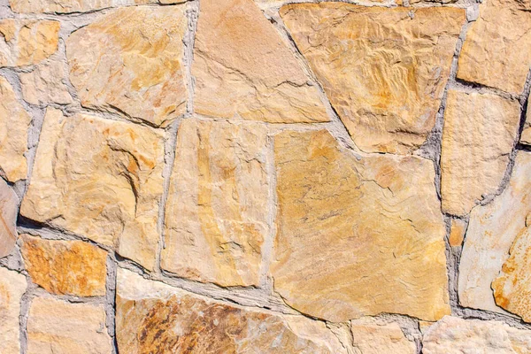 Texture of a stone wall for backgrounds on the house