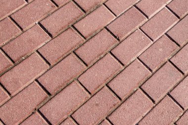 Parke taşlarının dokusu arka planlar için yere serilmişti.