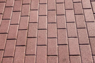 Parke taşlarının dokusu arka planlar için yere serilmişti.