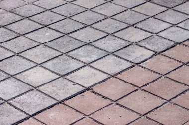 Parke taşlarının dokusu arka planlar için yere serilmişti.