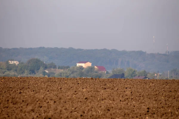 Plowed Field Houses Horizon September — Stock Photo, Image