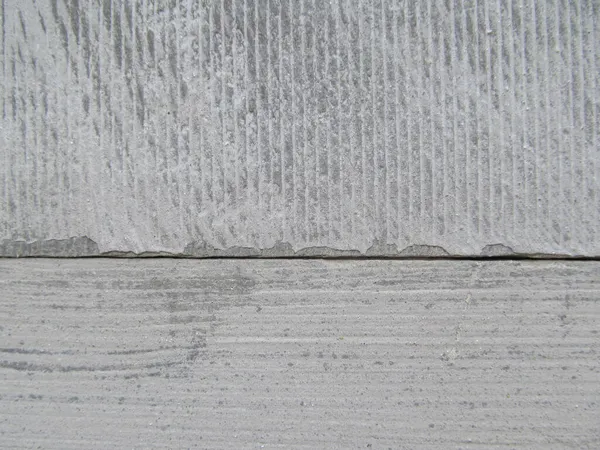 墙壁上灰色光滑石板的结构 — 图库照片