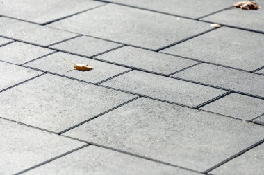 Arkaplan için renkli kaldırım taşı dokusu. Kaldırımda beton kaldırım.