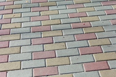Arkaplan için renkli kaldırım taşı dokusu. Kaldırımda beton kaldırım.