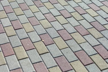 Arkaplan için renkli kaldırım taşı dokusu. Kaldırımda beton kaldırım.
