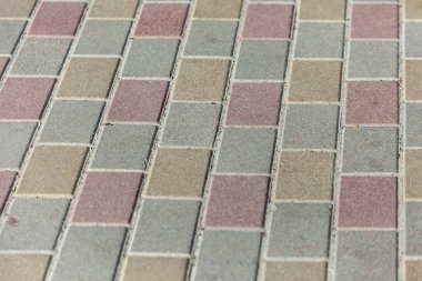 Arkaplan için renkli kaldırım taşı dokusu. Kaldırımda beton kaldırım.