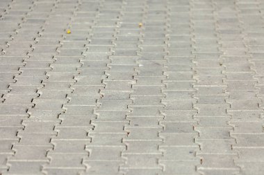 Arkaplan için renkli kaldırım taşı dokusu. Kaldırımda beton kaldırım.