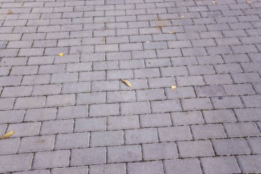 Kaldırımdaki beton kaldırımlar arka planlar için. Asfaltın dokusu, arkaplanı