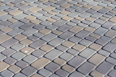 Arka plan için renkli kaldırım taşlarının dokusu. Kaldırımda beton kaldırım